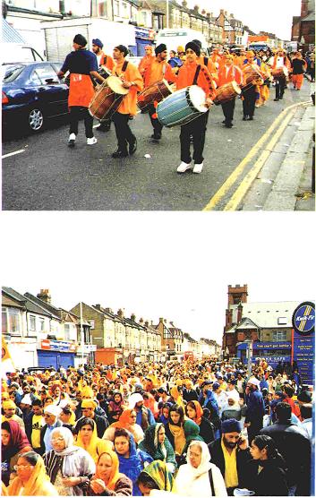 On the occasion of Vaisakhi Nagar Keertan, Young East London boys playing Dhole music at the head of a procession.